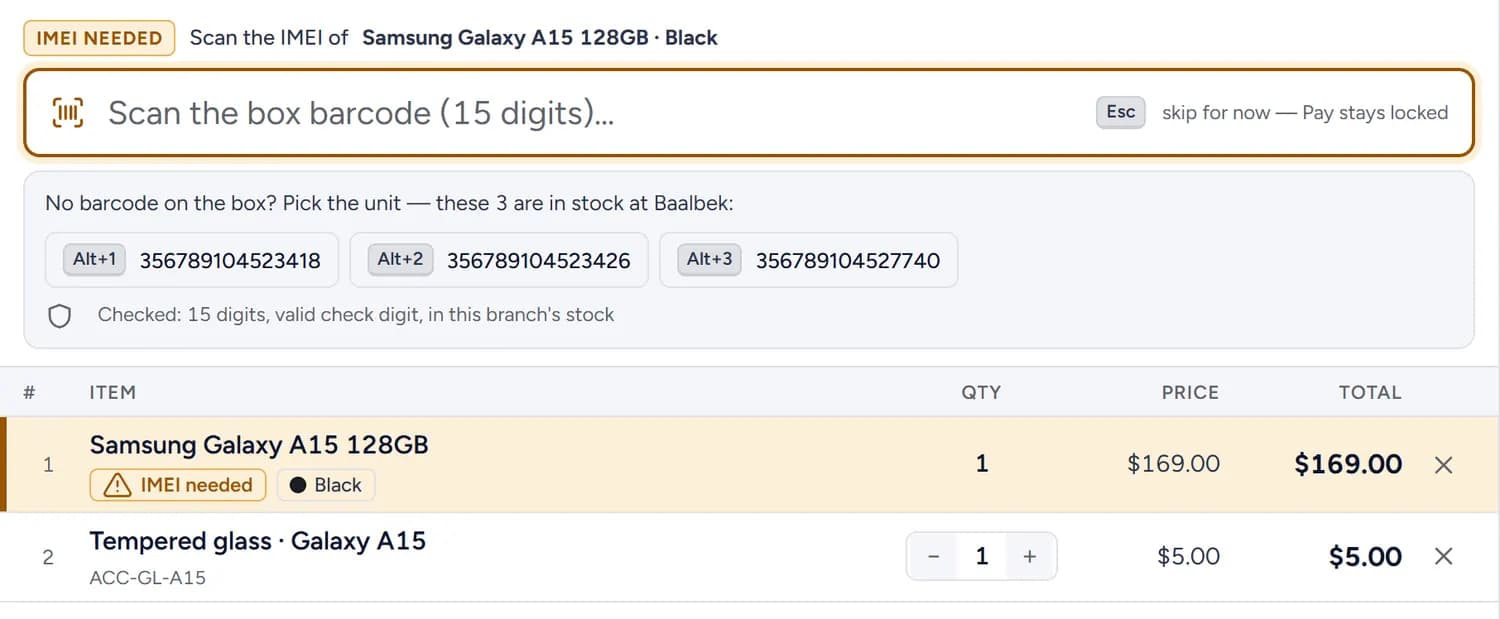 The counter asking for the phone’s IMEI before payment, with three units in stock to pick from.